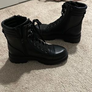 Nine West combat boots zip up on the side, never used